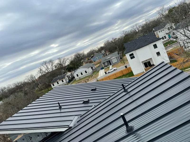 Standing seam metal roof panels with vents for Skylight Repair in Harvey